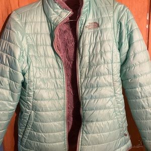 Girls, reversible North Face jacket. Mint green synthetic shell with soft grey.